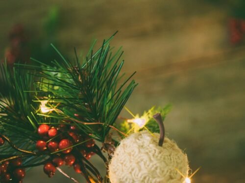 a close up of a christmas tree with lights