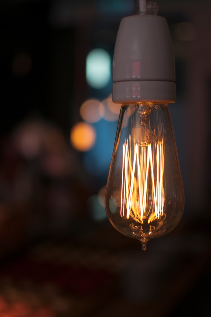 clear light bulb turned on in tilt shift lens