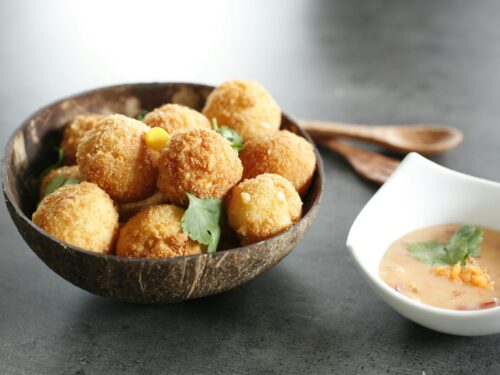 fried food on brown ceramic bowl