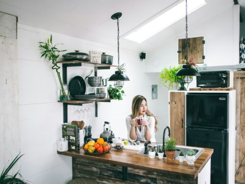 woman sitting in front of table