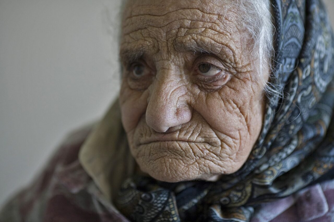 Wrinkled face old lady woman female lines of life powerful face.jpg