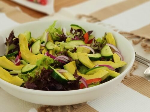sliced vegetables in ceramic bolw