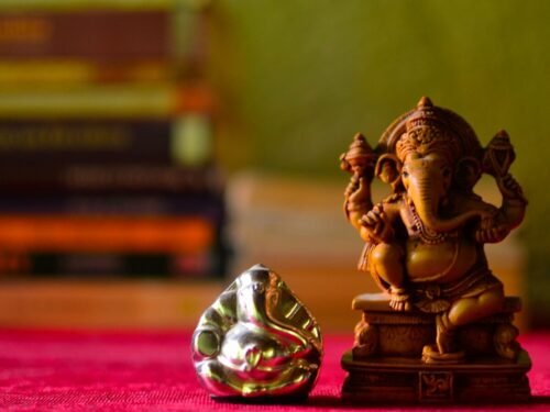 a couple of gold statues