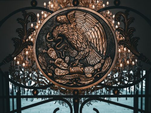 a chandelier with a picture of an eagle on it