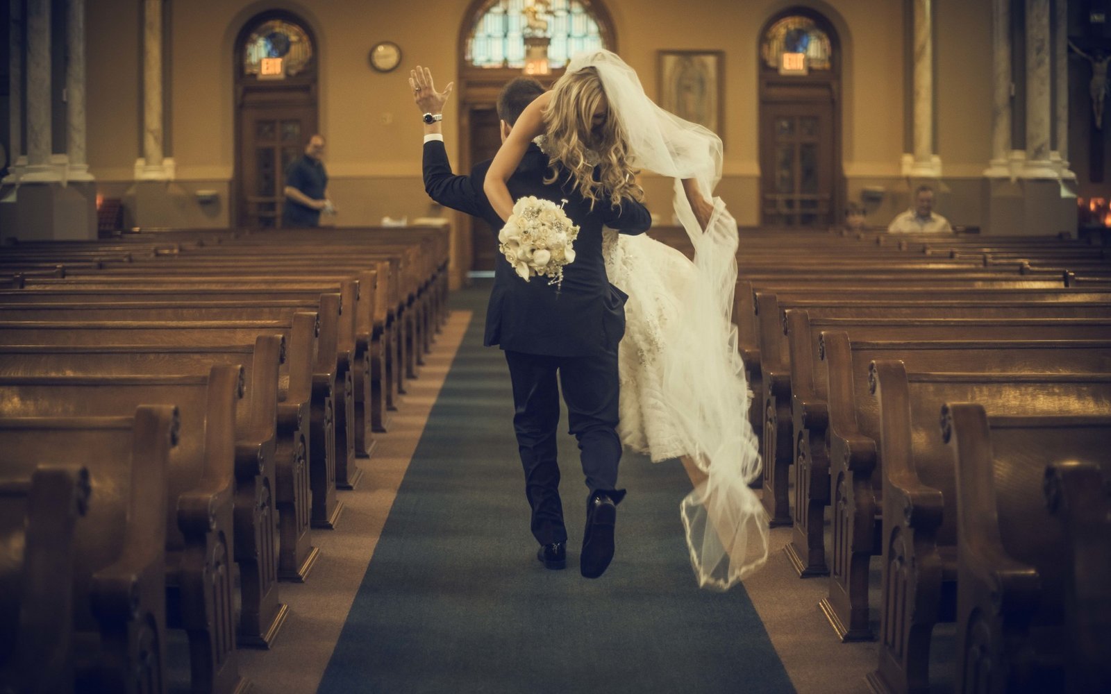 Funny groom kidnap bride church.jpg