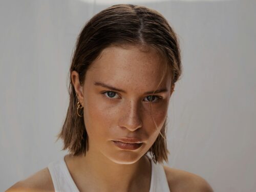 woman in white tank top