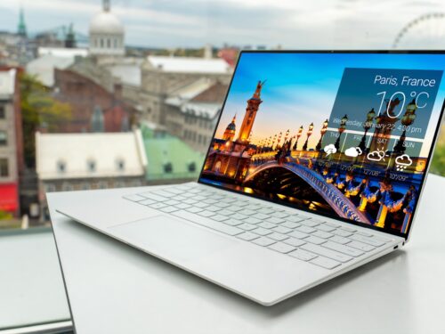 laptop on white table