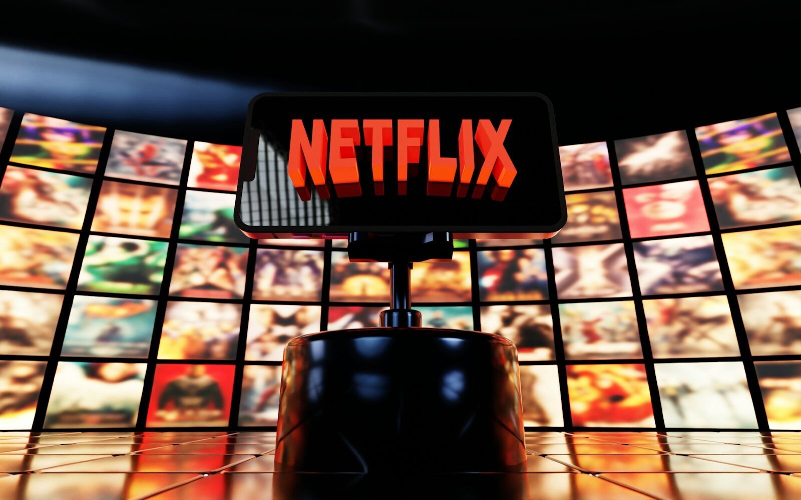 Netflix logo displayed on a screen with movie posters
