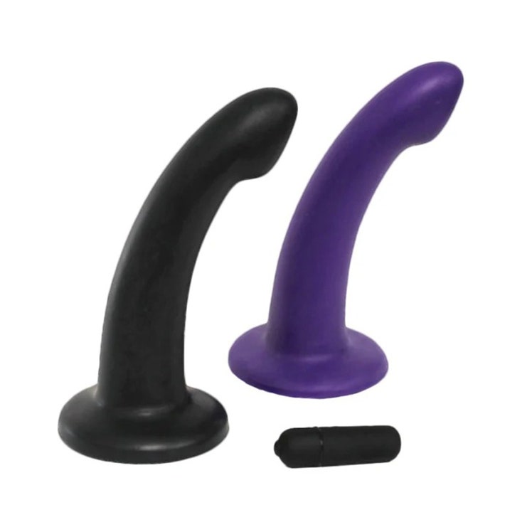 Black dildo and purple dildo with bullet vibrator