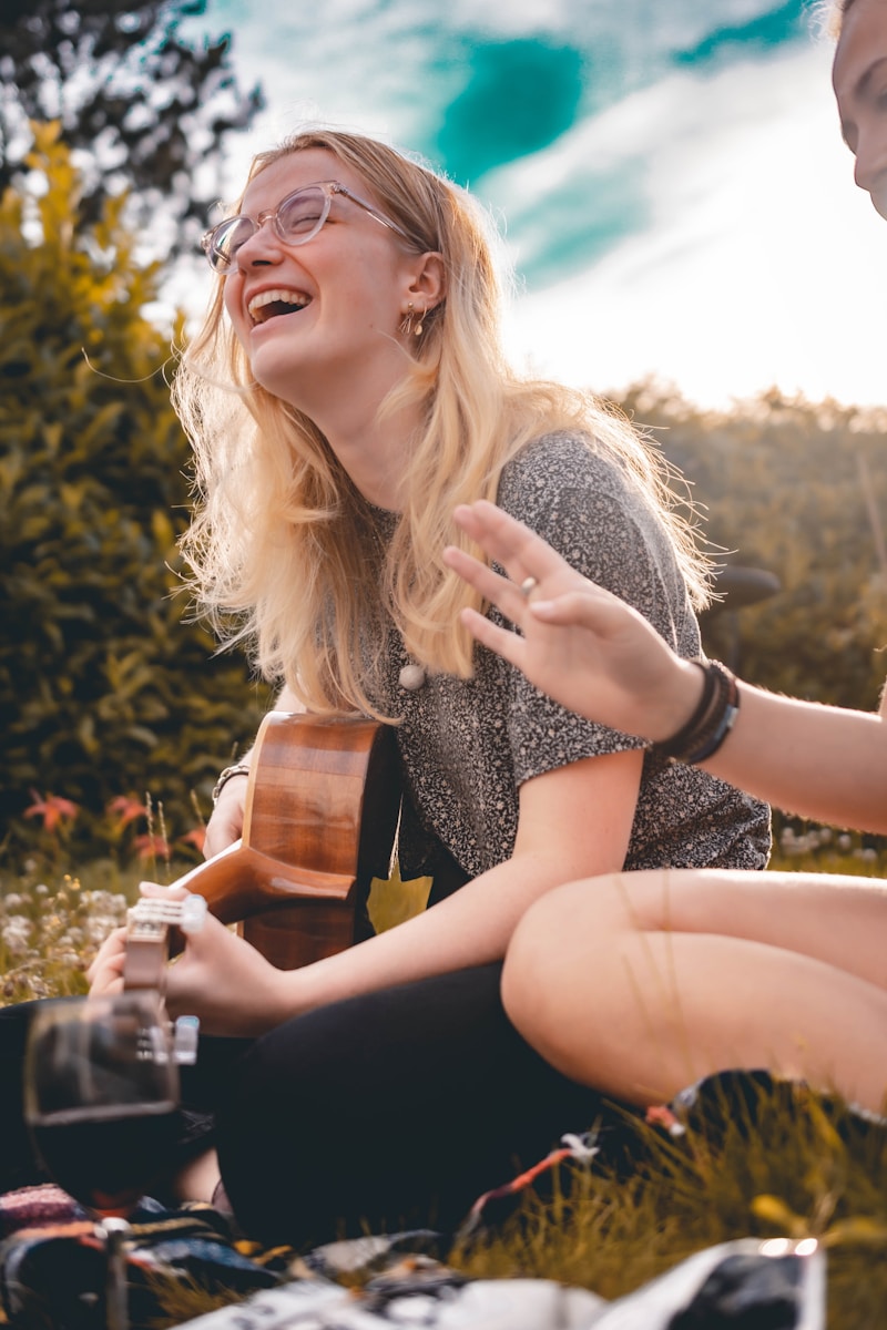 woman playing guitar