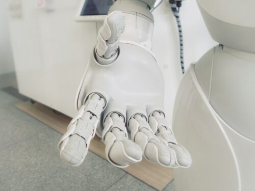 closeup photo of white robot arm