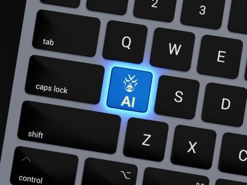 a computer keyboard with a blue light on it