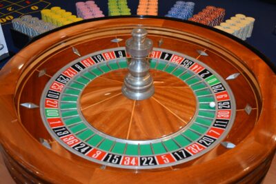 brown and silver round analog clock