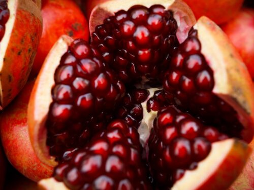 close-up photo of sliced pomegranate