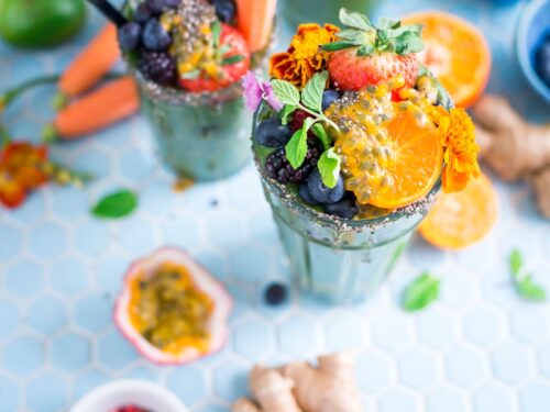 tilt shift lens photography of fruits in drinking glass