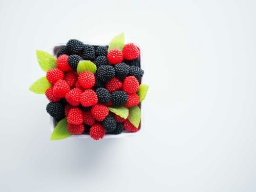 bowl of red and black berries