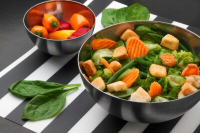 sliced vegetables on stainless steel bowl