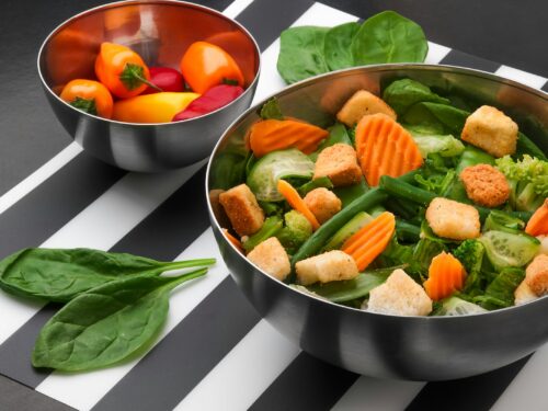 sliced vegetables on stainless steel bowl