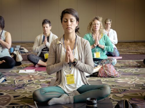 group of people doing yoga